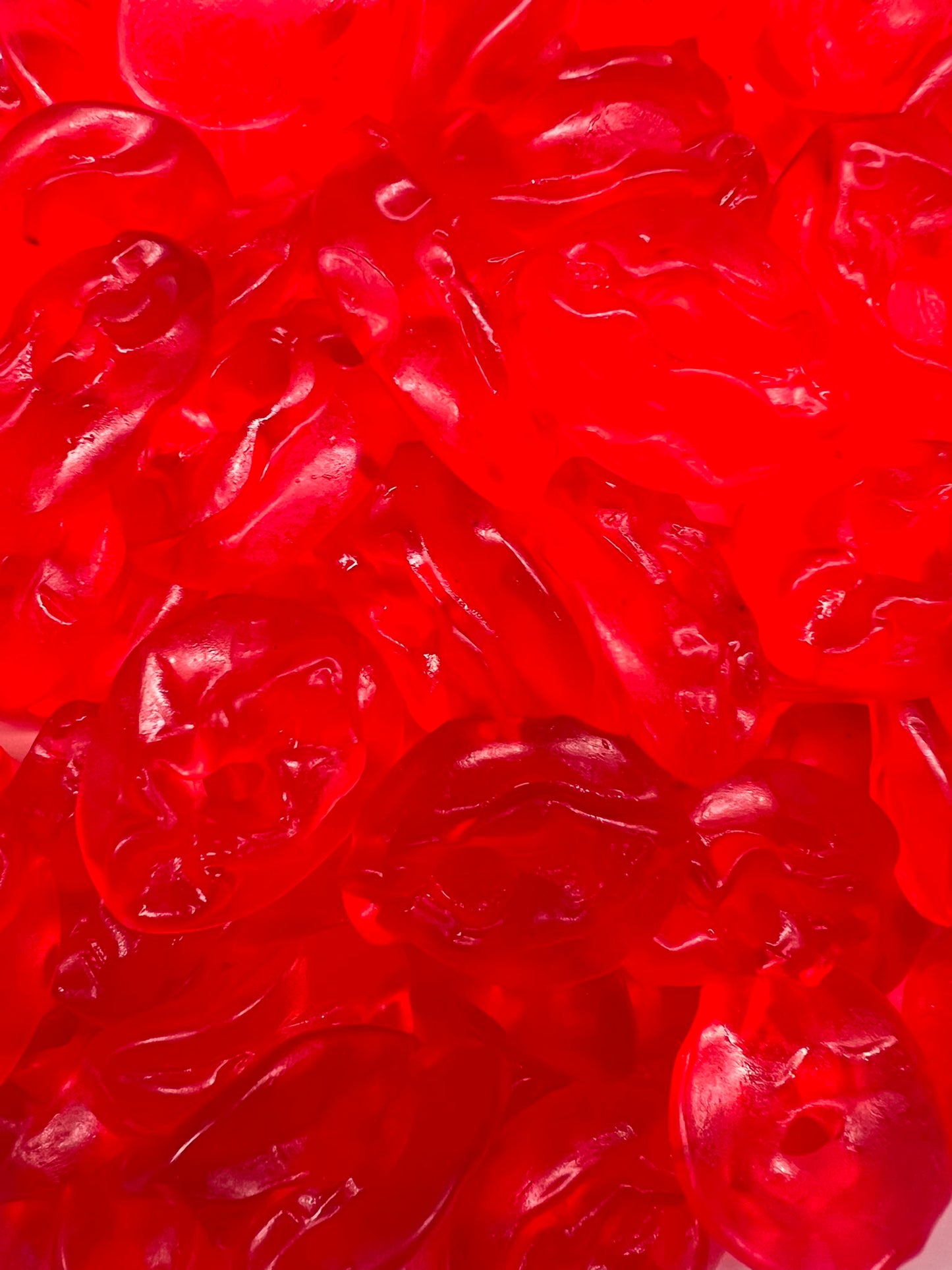 Roze Mutsjes Poesjes – glanzende rode winegums in mutsjesvorm van Snoepkes.nl